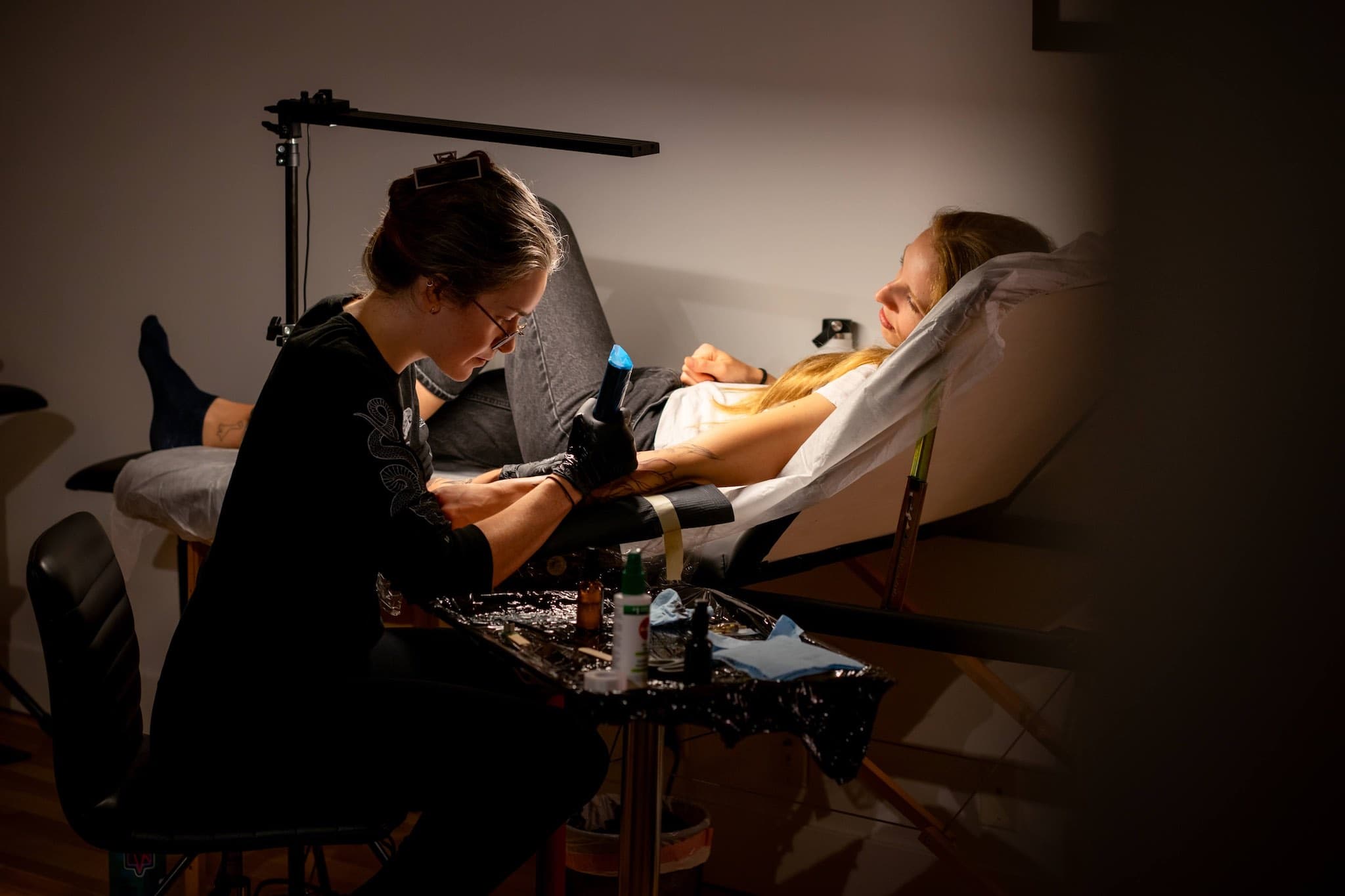 Kait Rogers Tattooing a Client